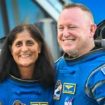 Butch Wilmore and Suni Williams, wearing Boeing spacesuits, depart the Neil A. Armstrong Operations and Checkout Building at Kennedy Space Center for Launch Complex 41 at Cape Canaveral Space Force Station in Florida to board the Boeing CST-100 Starliner spacecraft.