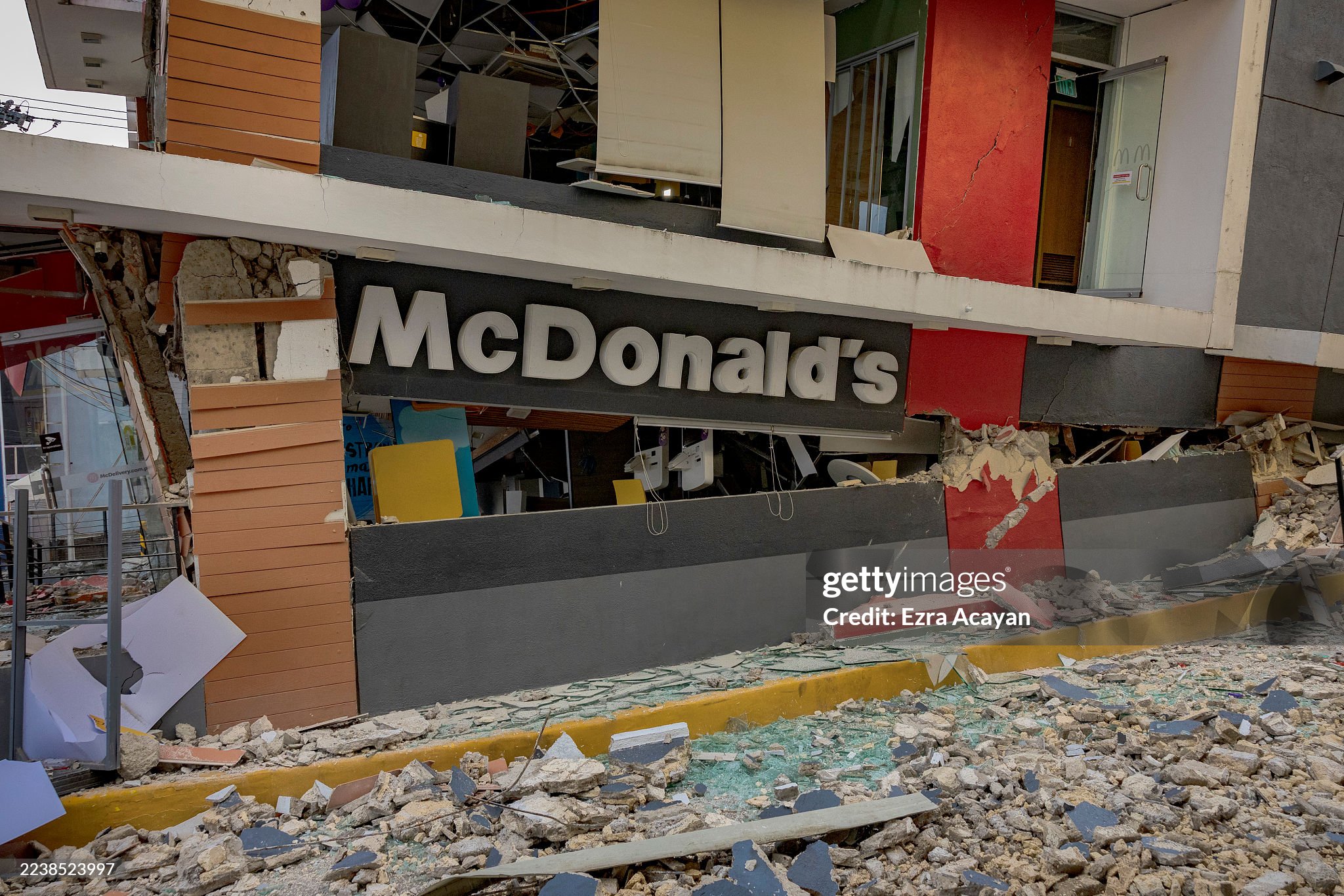 Damaged buildings and cracked roads in Bogo, Philippines, after a 6.9 magnitude earthquake.